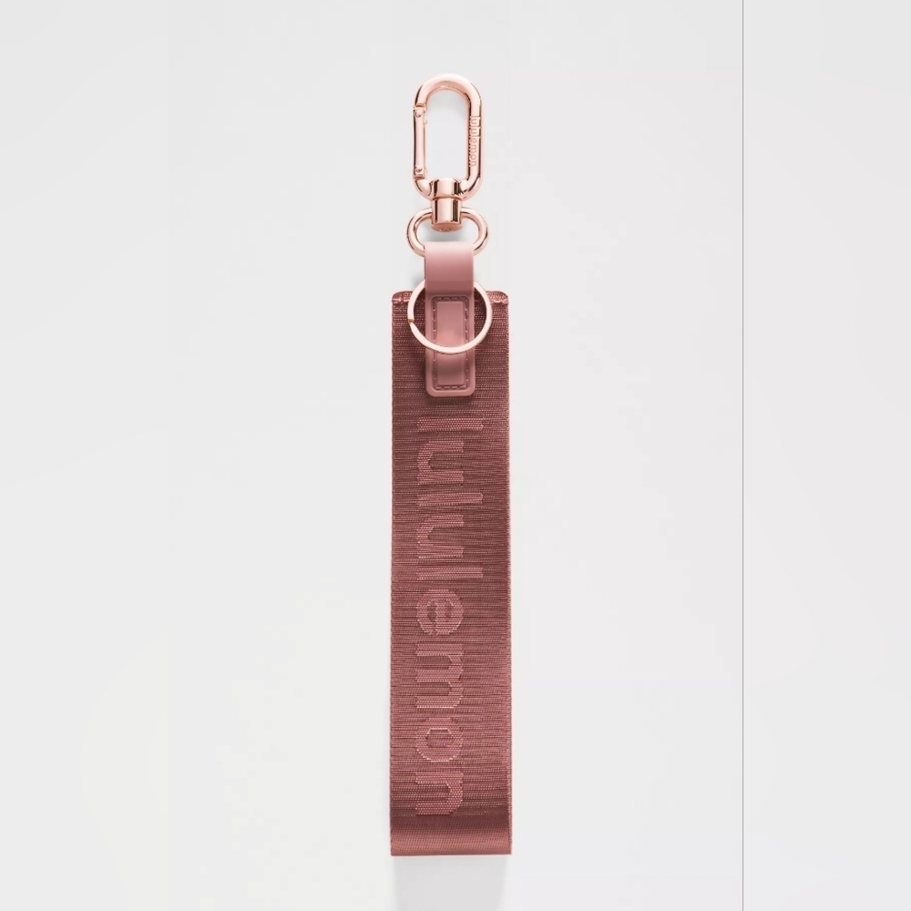 Lululemon Athletica Never Lost Key Chain- In REDC/ROWD- SOLD OUT COLOR!!